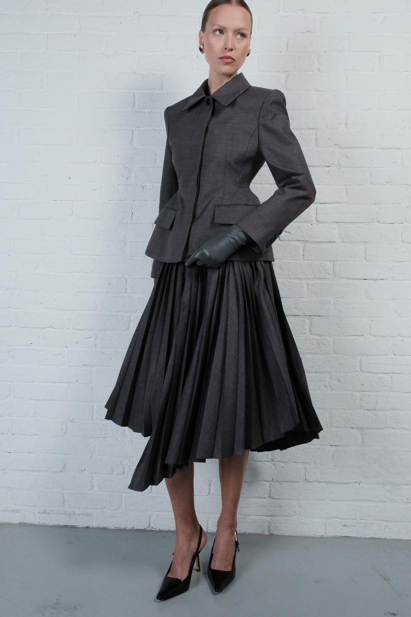 Asymmetric pleated skirt